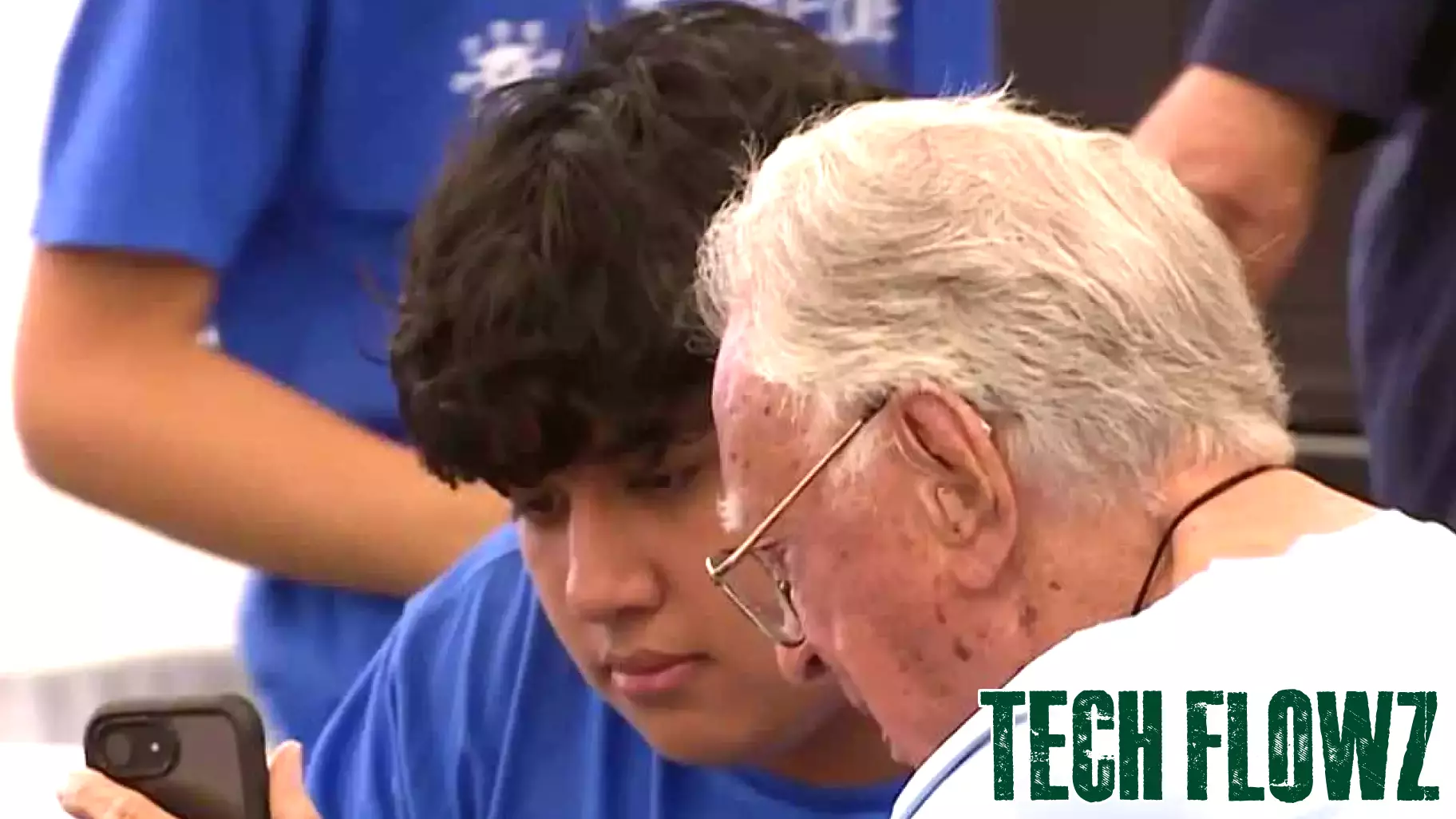 High school students help seniors with technology at Wellington Bay